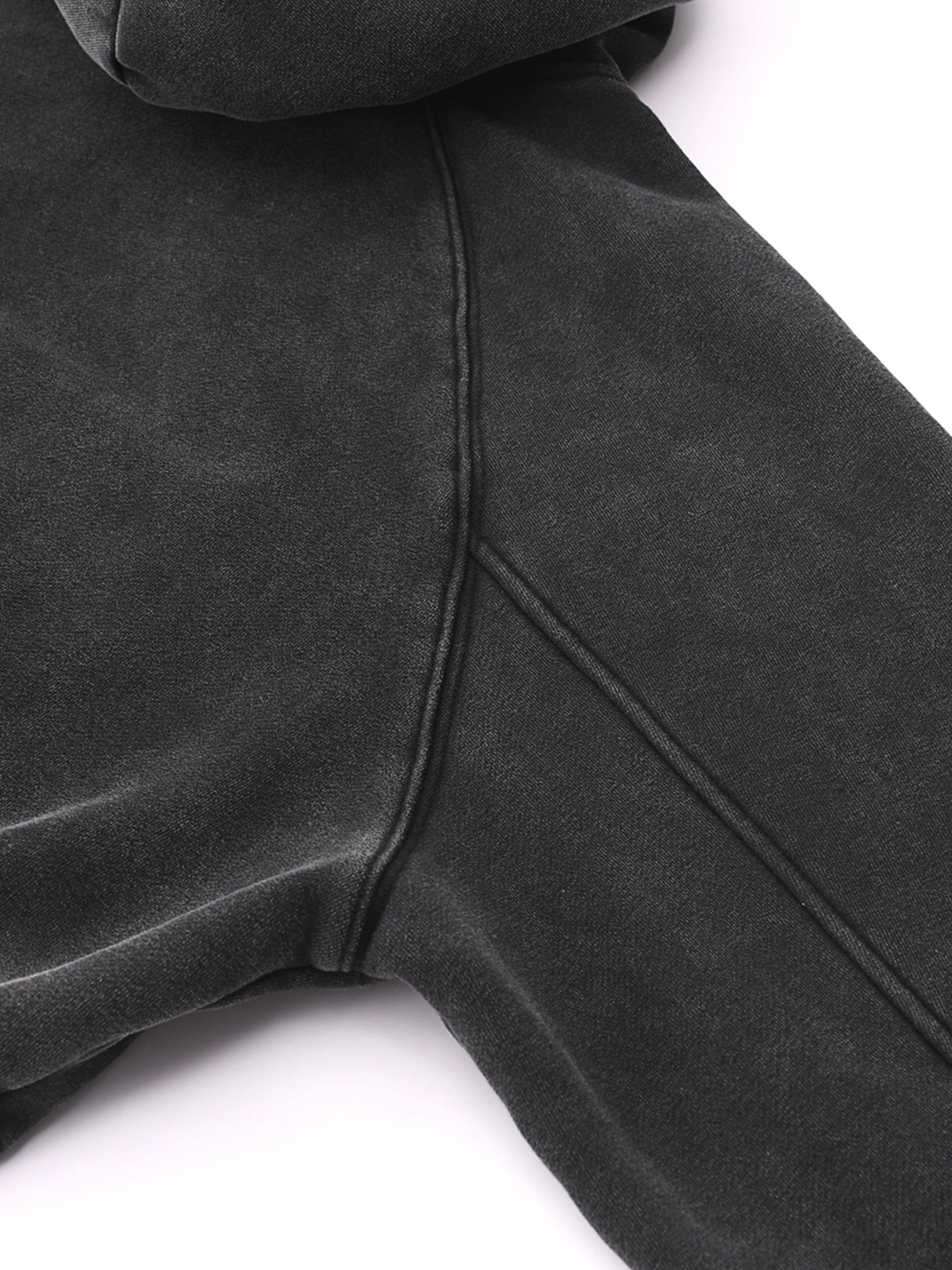 Black pullover hoodie from DR3A Collection, lifestyle